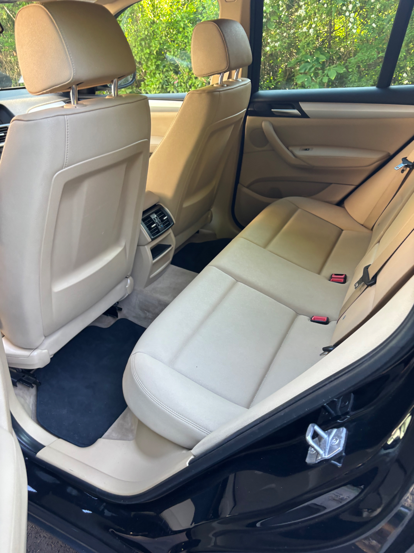 Cream leather rear seats detailed to like-new
